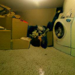 Photo of a dingy basement with boxes, laundry machines, and a television